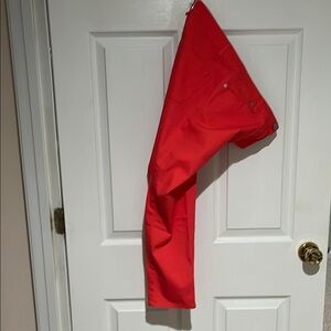 Vibrant orange pants jean cut